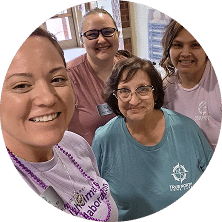 True North Home Care caregivers smiling together in a group photo
